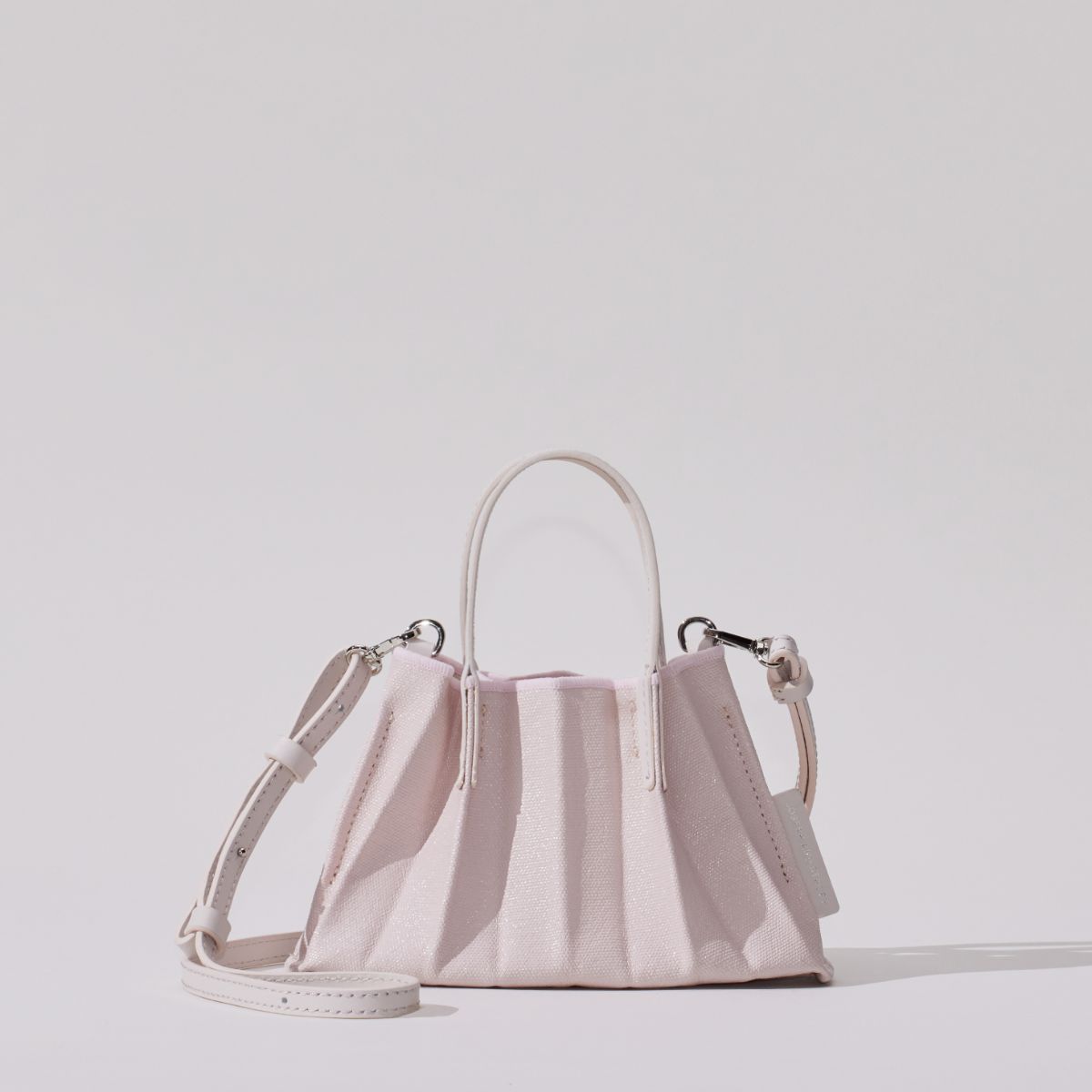 ラッキープリーツキャンバスコーテッドベビーバッグ ペイルピンク