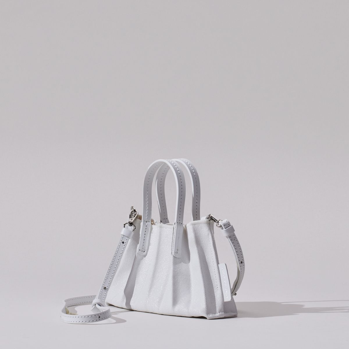 ラッキープリーツキャンバスコーテッドベビーバッグ ホワイト