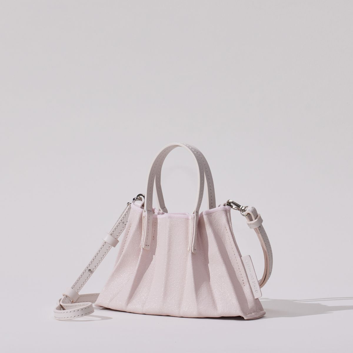 ラッキープリーツキャンバスコーテッドベビーバッグ ペイルピンク