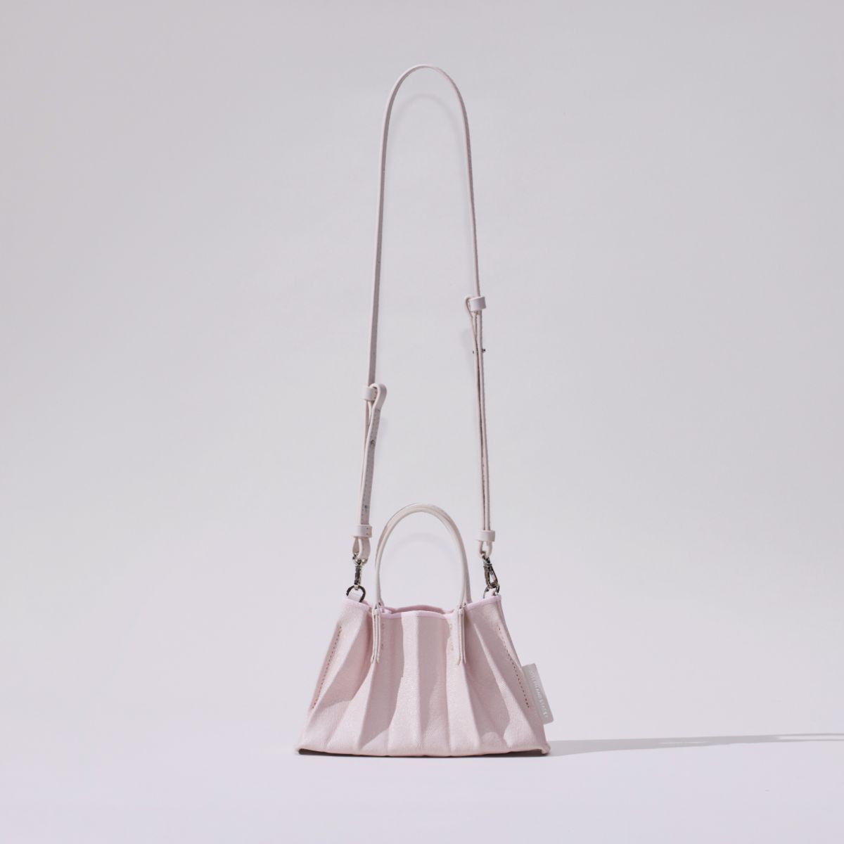 ラッキープリーツキャンバスコーテッドベビーバッグ ペイルピンク